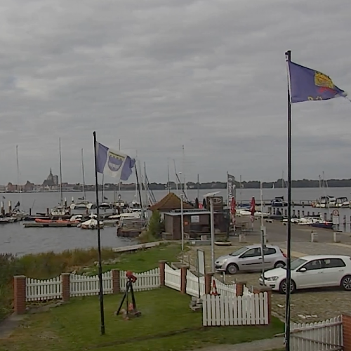 Altefähr Harbor Live: Views of the Strelasund and Stralsund Skyline