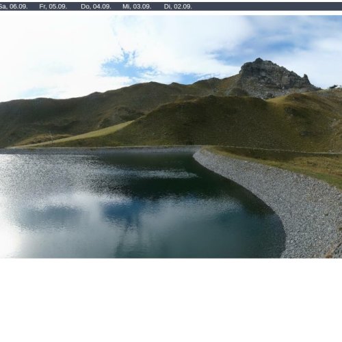 Hochfügen Zillertal Live Webcam – Alpine Lake & Mountain Views