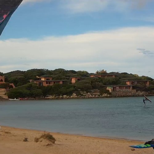Porto Pollo Beach - Hosted Wind Bar: A Sardinian Paradise 🌊