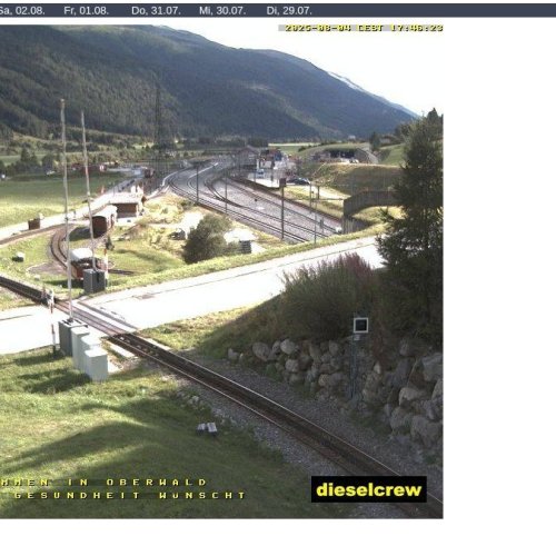 Oberwald Goms Live Webcam: Alpine Valley & Railway Views