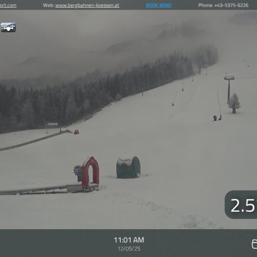 Kössen Landeplatz Live Webcam: Alpine Skiing & Mountain Views